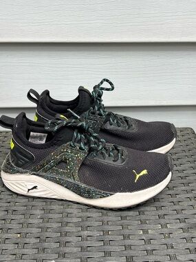 Puma Black Knit Sneakers with Neon Yellow Logo and Speckled Accents